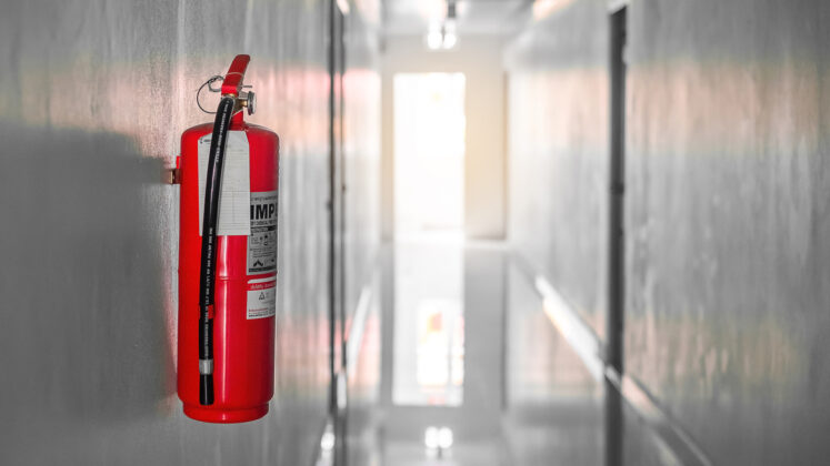 Fire Extinguisher mounted on a council building wall